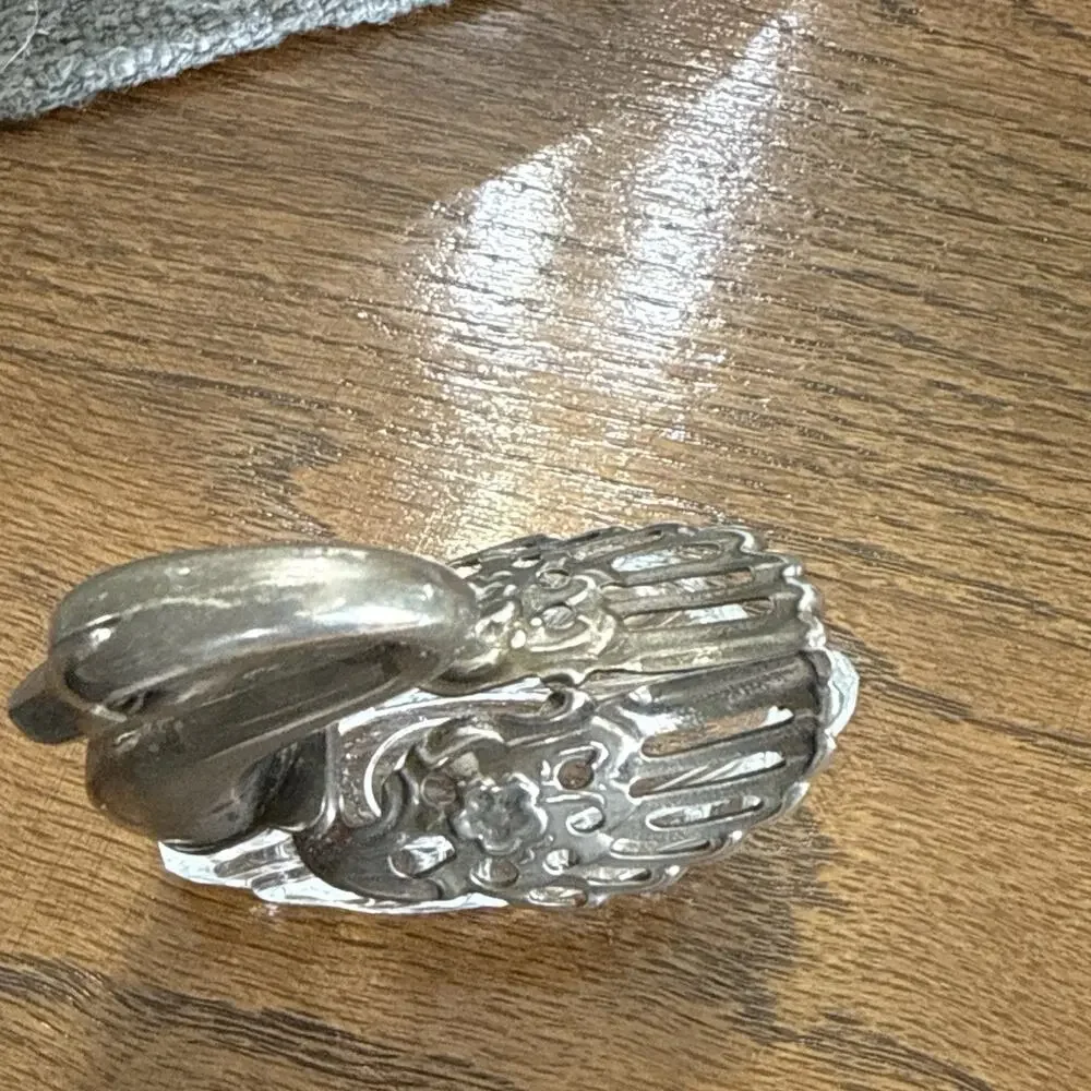 A silver-plated Italian swan salt cellar with moveable wings.